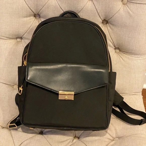 ?tumi medium size black leather and canvas women’s backpack Branded Tumi Dynamic Backpack 1426141041 Black main image 3